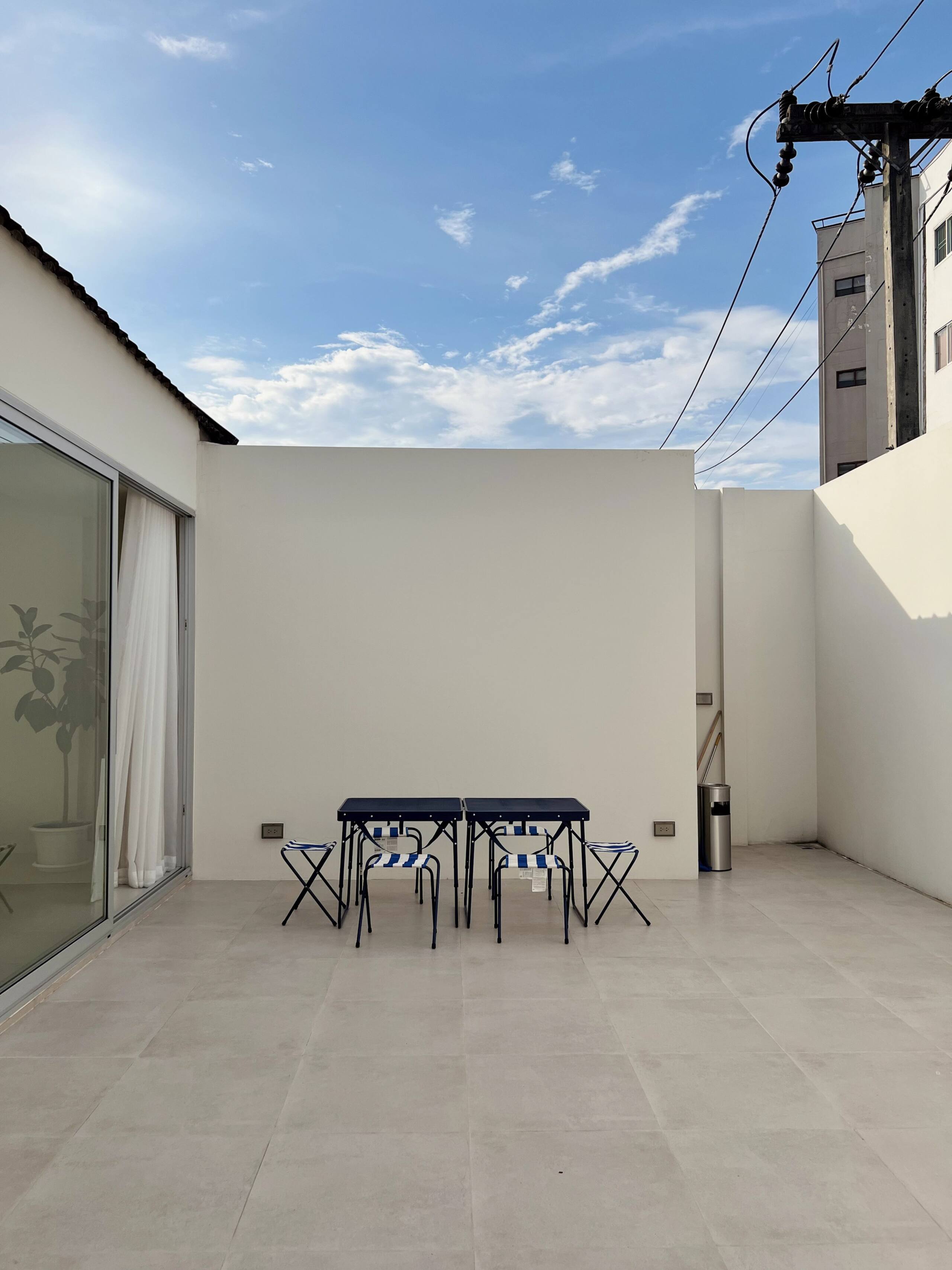 Balcony with outdoor seating at Aube Chiang Mai